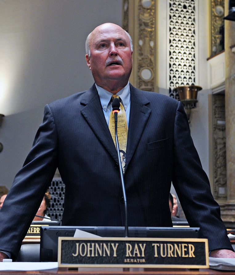 Johnny Ray Turner speaking at his Kentucky Senate desk